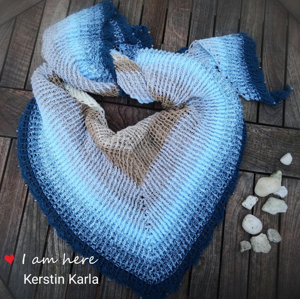 Ein Talvi mit Perlen-Häkelborte